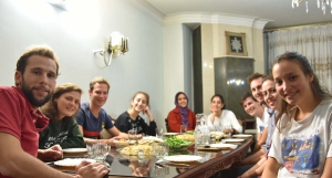 Persians and European travelers having dinner together at NarcisBnB in Isfahan